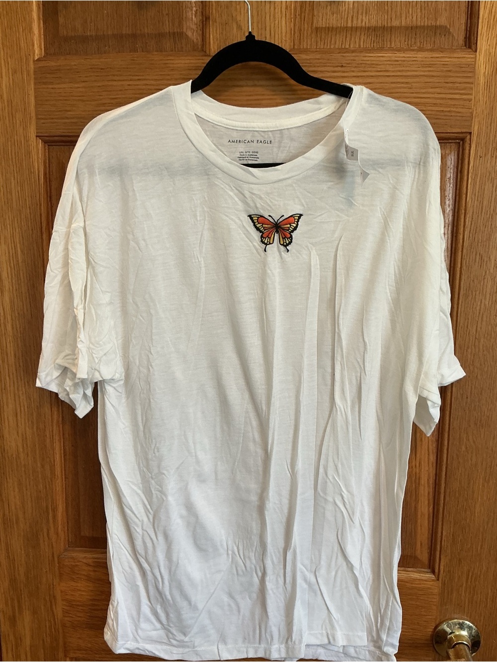 American Eagle Outfitters White T-Shirt with Orange and Black Butterfly